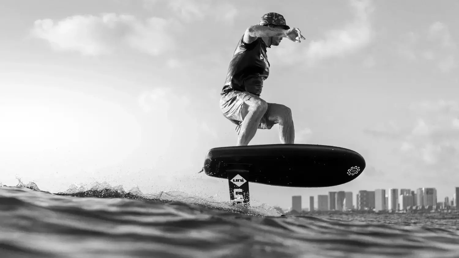 Majek Carbon foilboard by Glenn Pang x Lucia Glassing rides in water