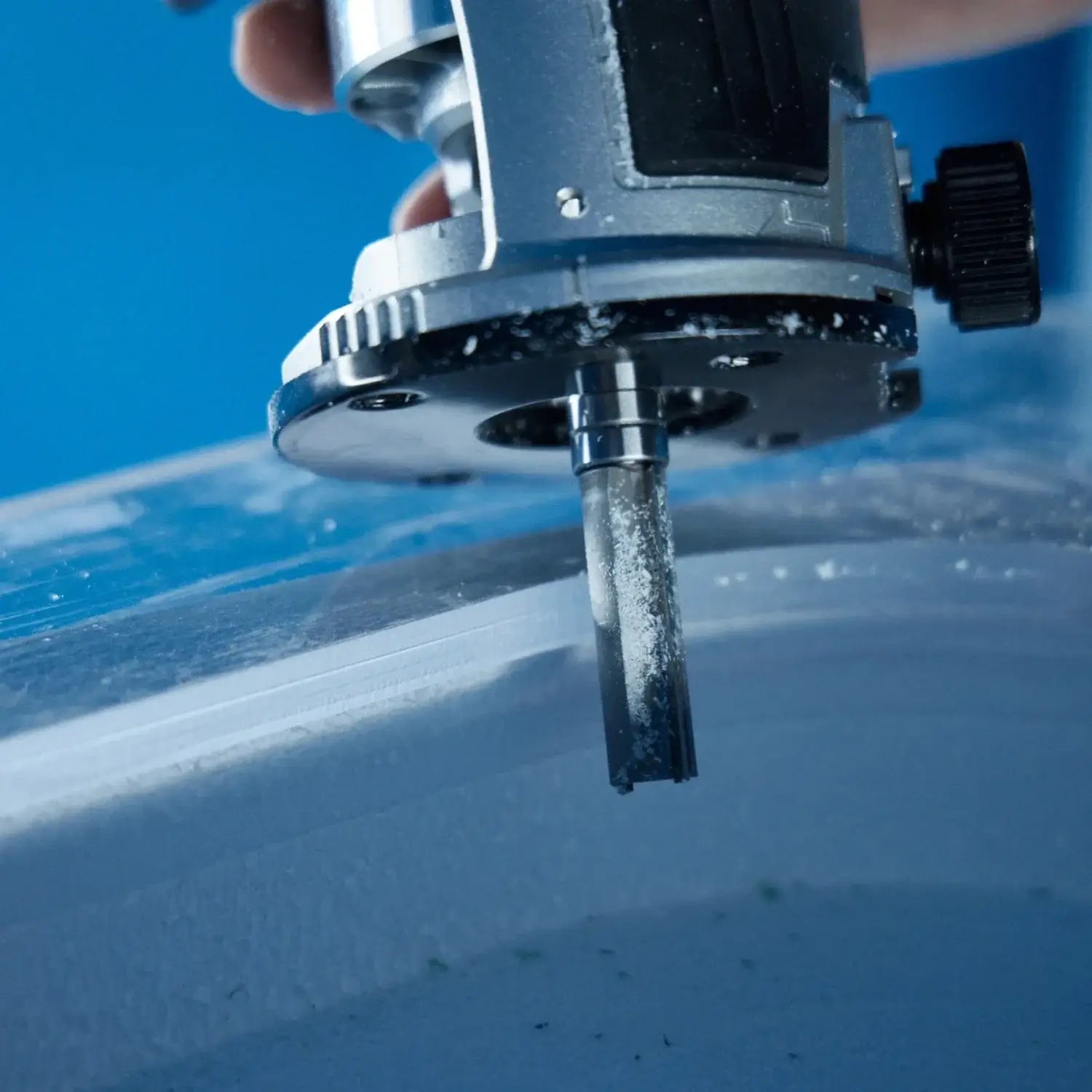 Close up of a tool shaping the hole in a foilboard foam blank to insert a foam insert using a Foil Tec jig kit