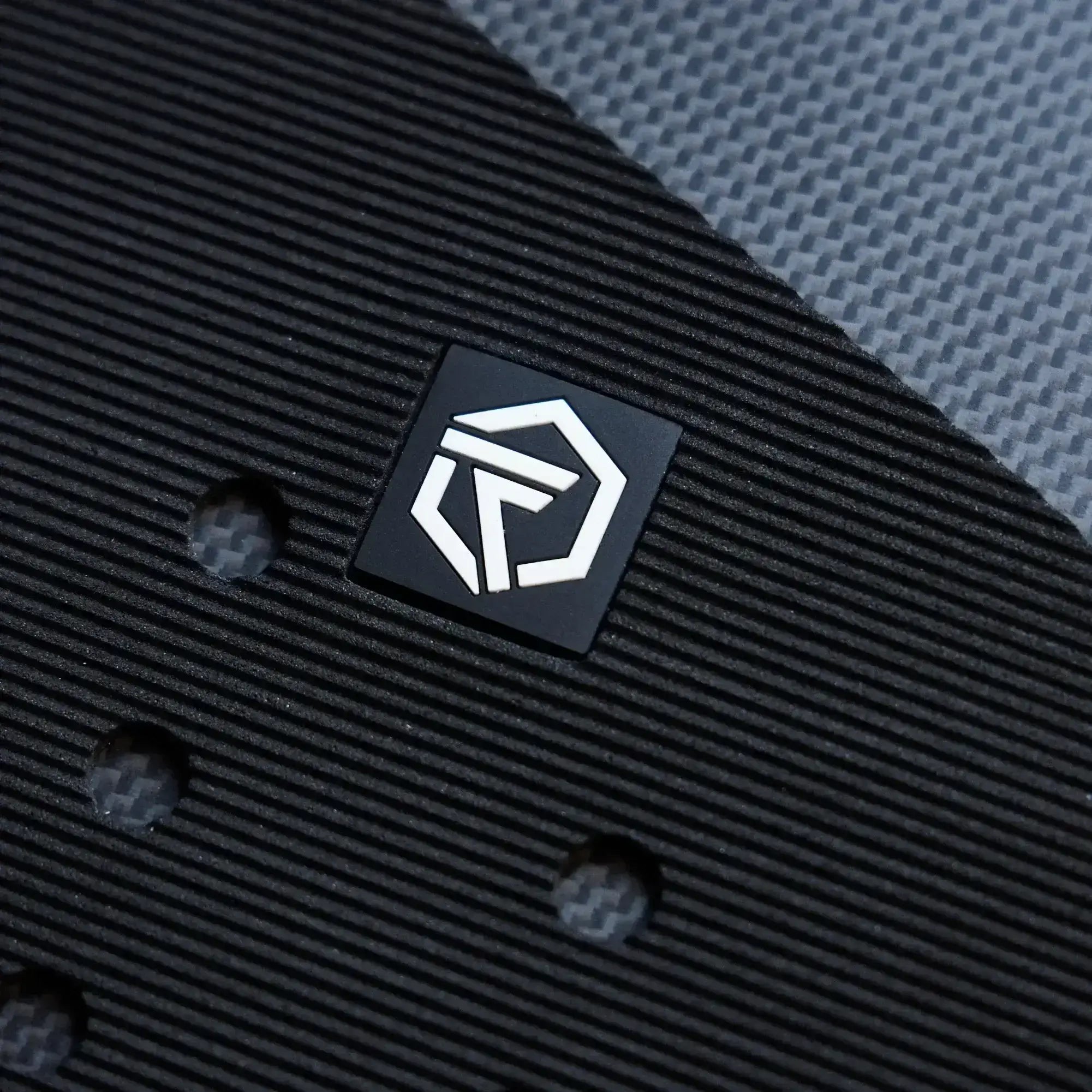 Close-up of cord texture and cut-out detailing on foilboard traction pad