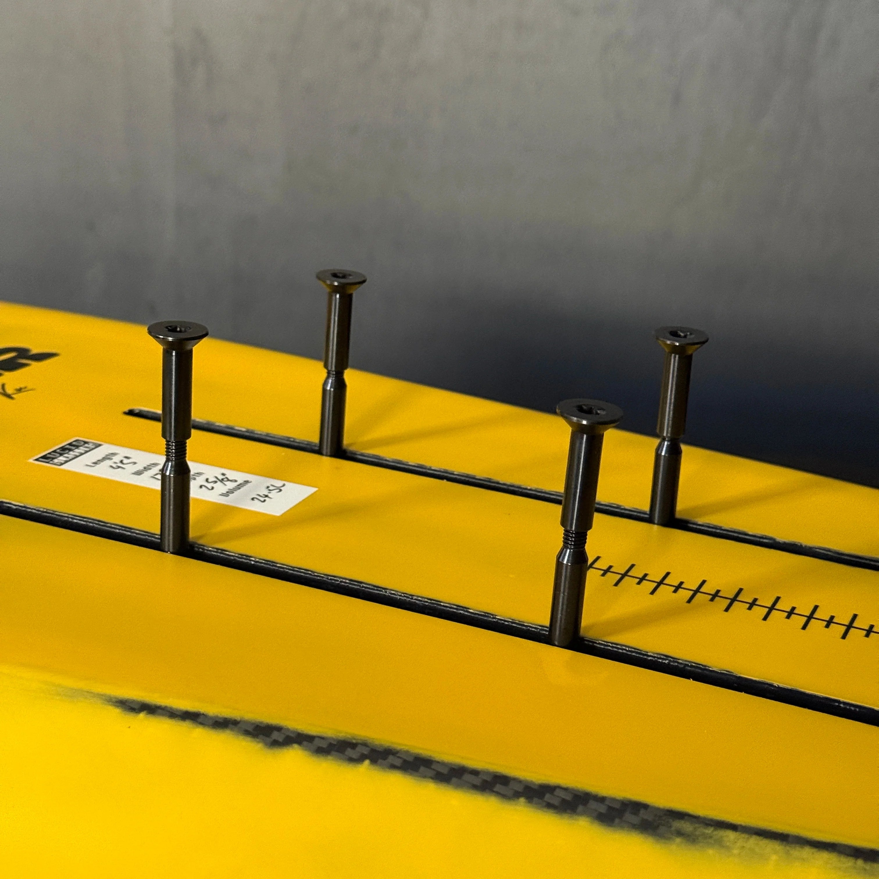 Titanium M8 split bolt shown mounted in hydrofoil track