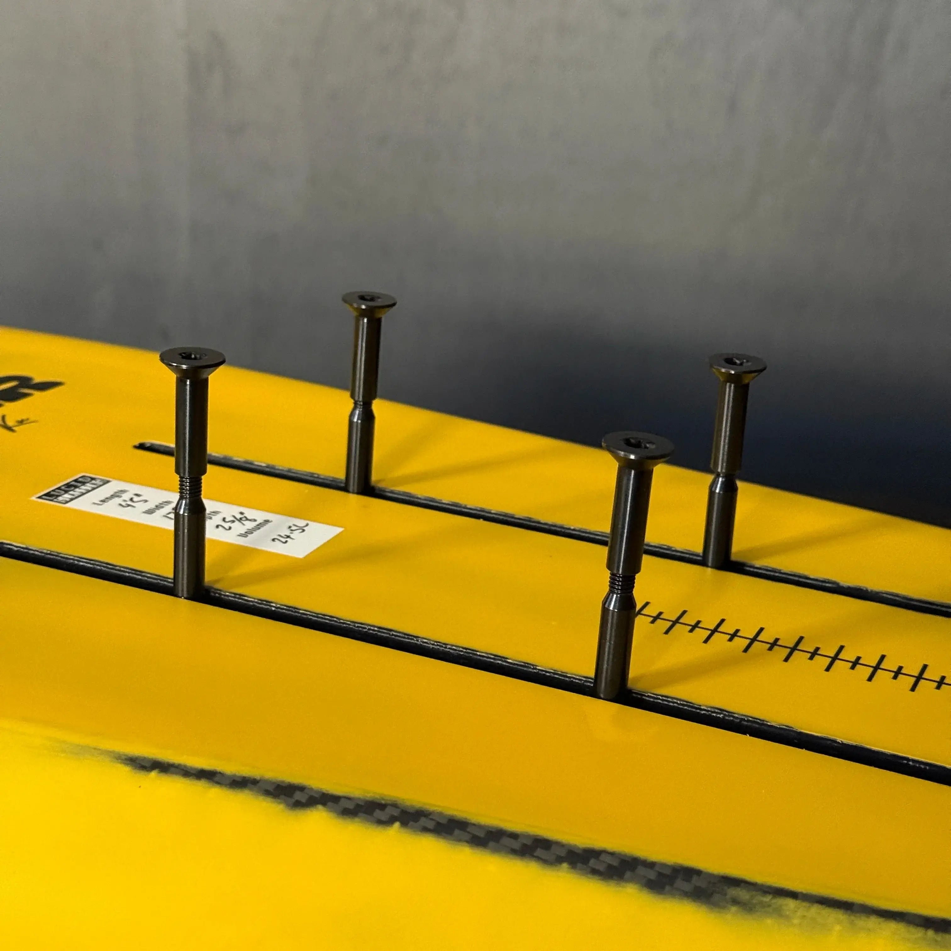 Titanium M8 split bolt shown mounted in hydrofoil track