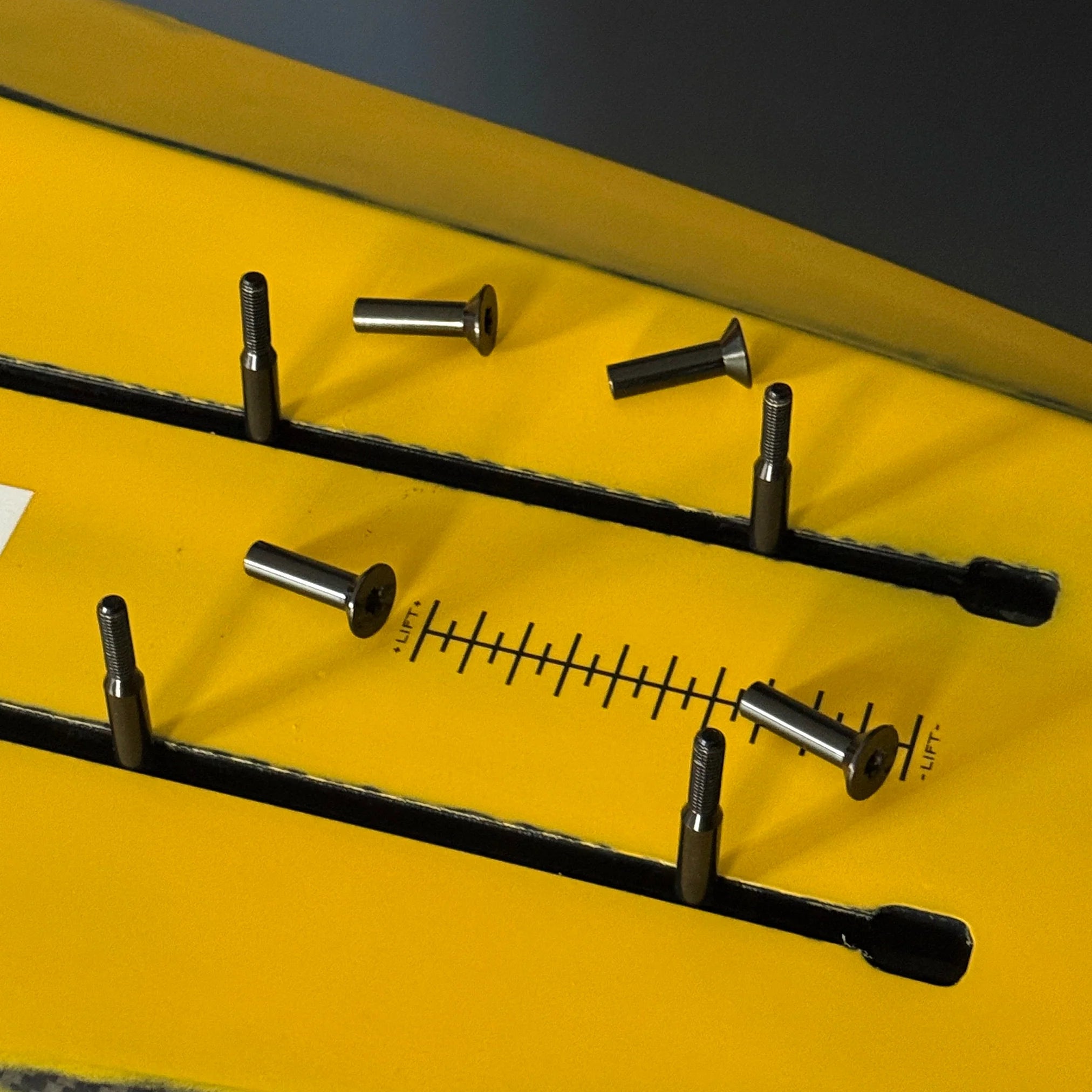 Titanium M8 split bolt shown mounted in hydrofoil track