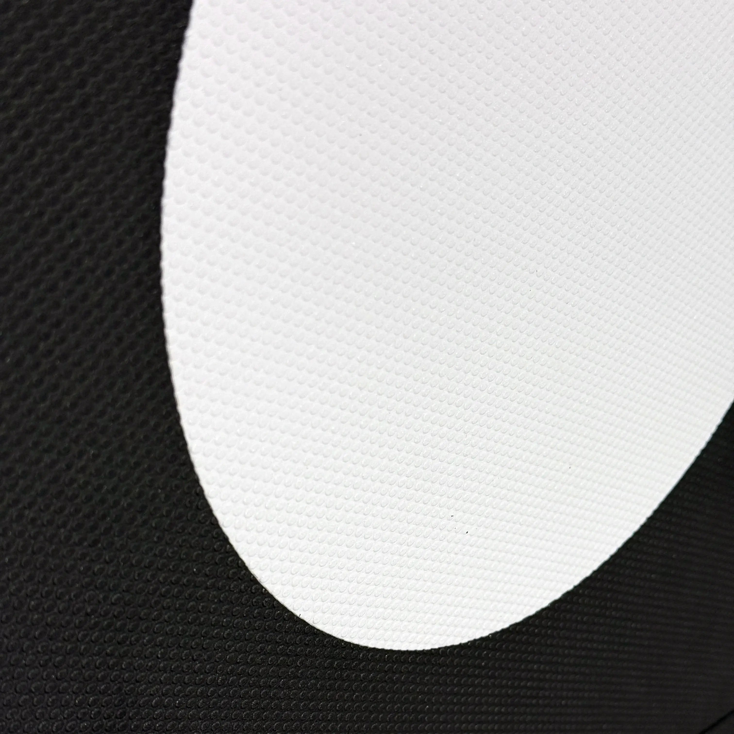 Close-up of White Dot colour EVA traction pad – two-piece layout