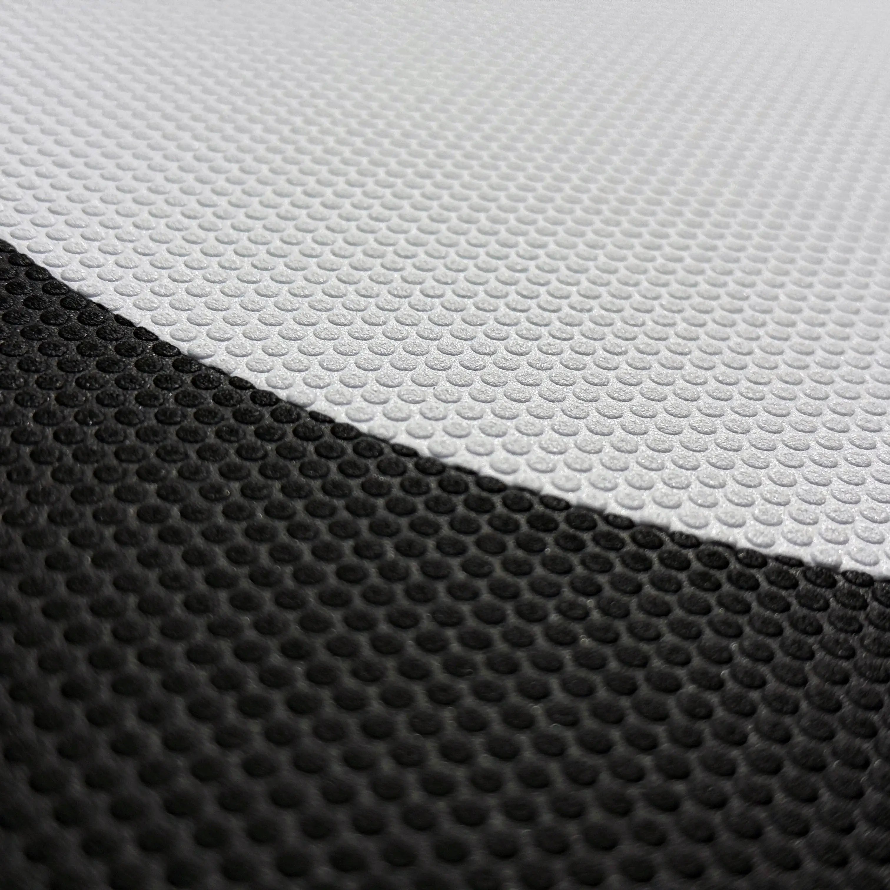 Close-up of White Dot two-piece traction pad – large foilboard fit