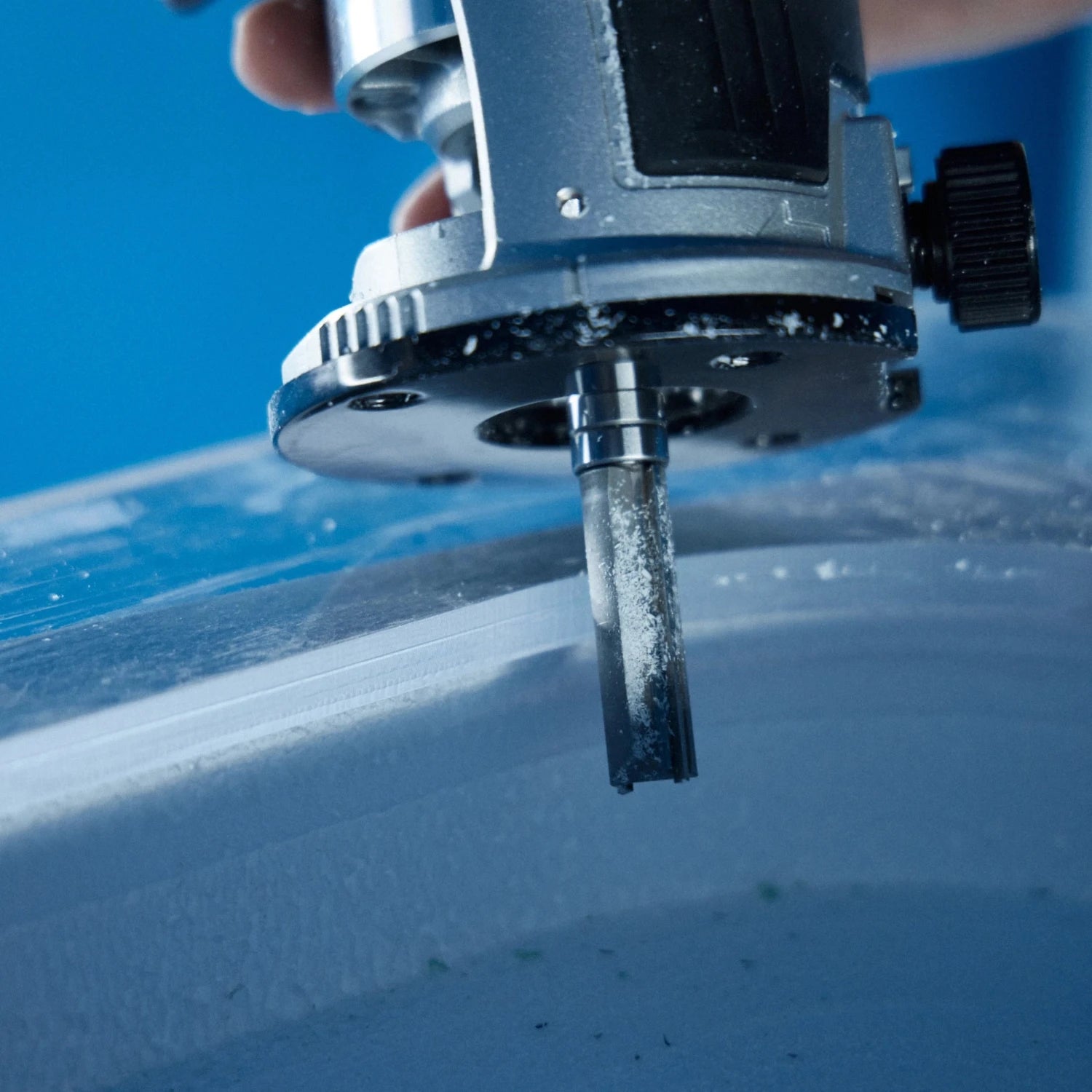 Close up of a tool shaping the hole in a foilboard foam blank to insert a foam insert using a Foil Tec jig kit 